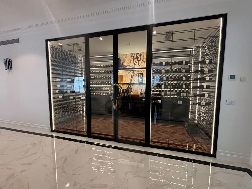 a wine cellar with glass doors