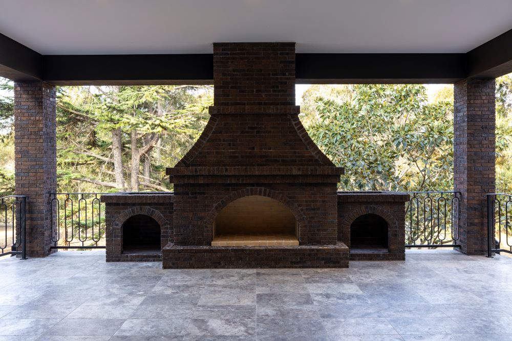 Suspended brick fireplace