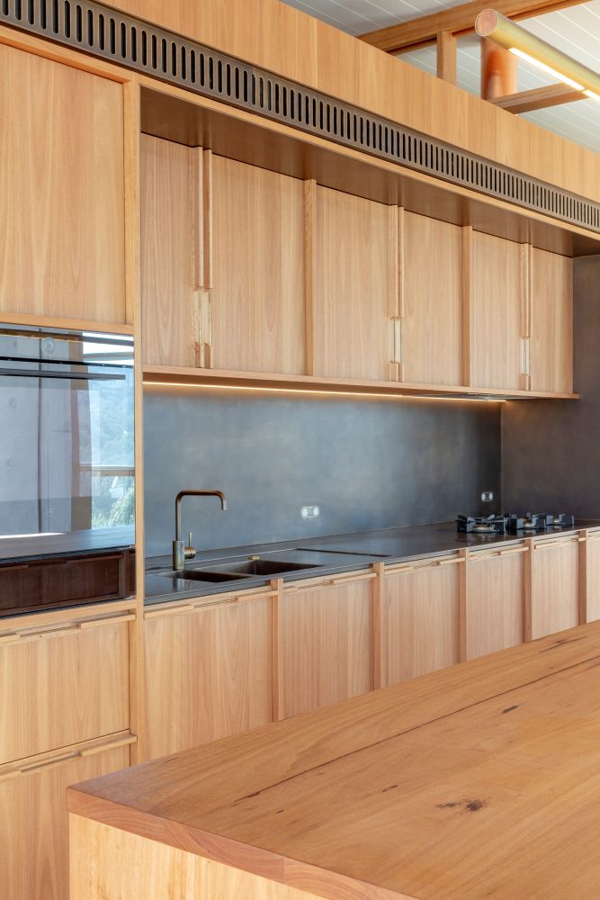 Luxury kitchen in Avalon custom home featuring V-Zug Appliances