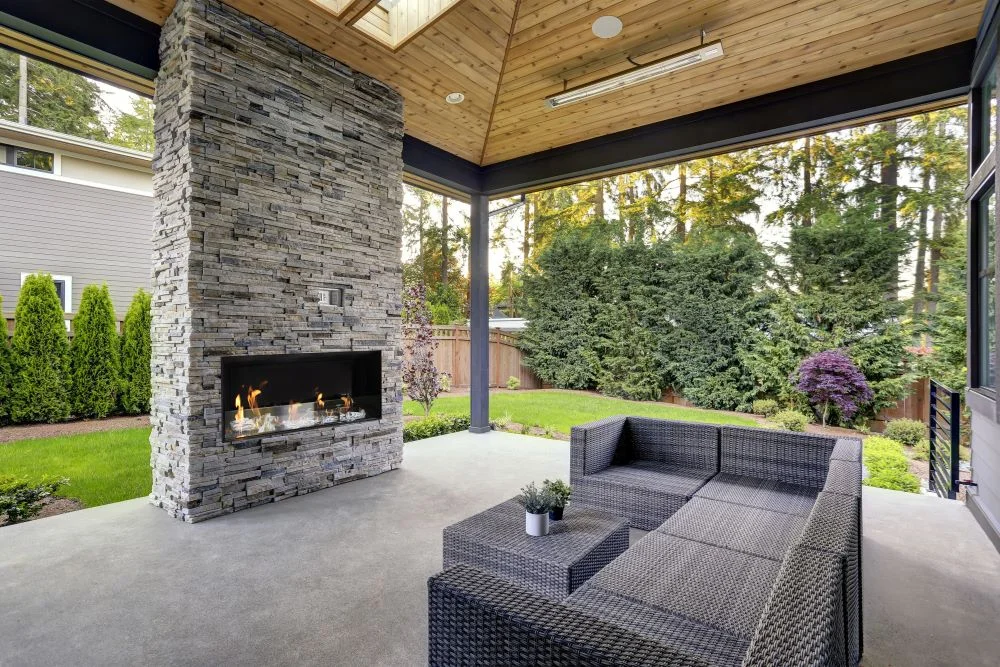 Outdoor alfresco fireplace creating a warm entertaining space