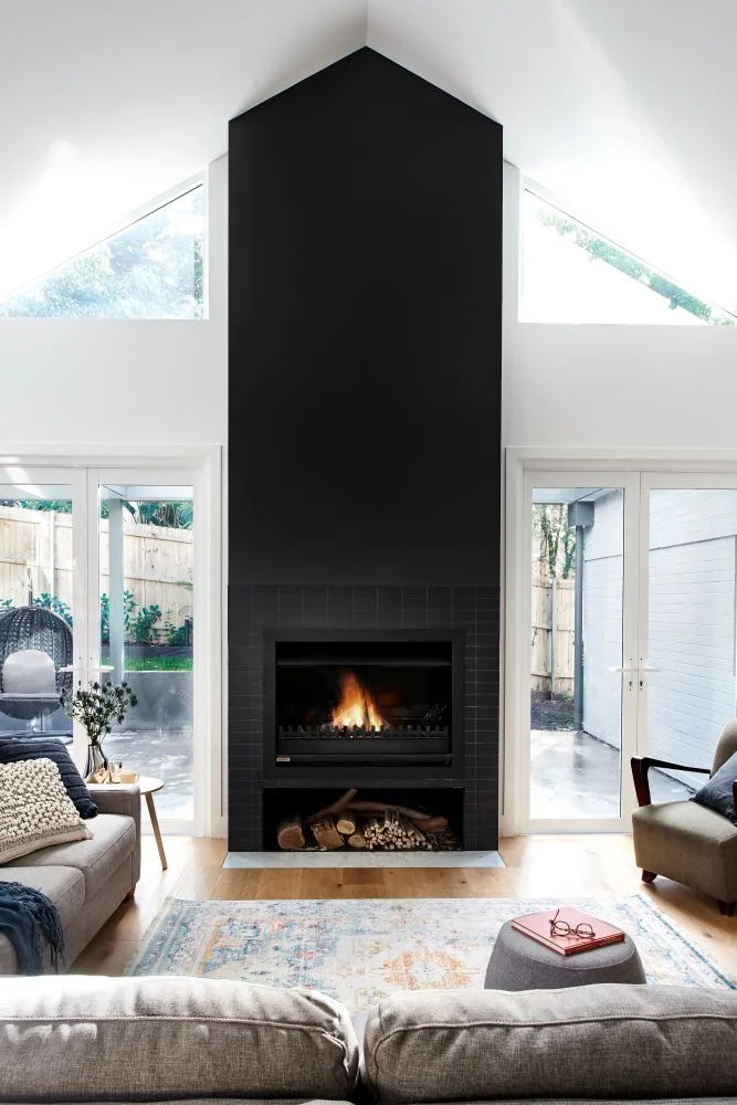 Minimalist living room with large contemporary gas fireplace