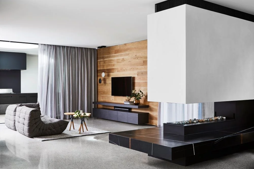 Sleek modern gas fireplace creating a luxury living room focal point