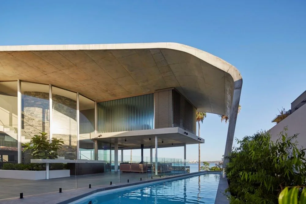Luxury concrete custom home with exposed concrete exterior