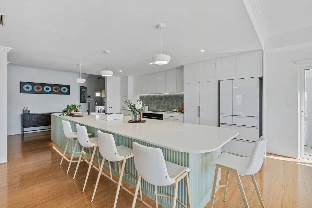 Perth coastal kitchen renovation with fluted island and curved cabinetry