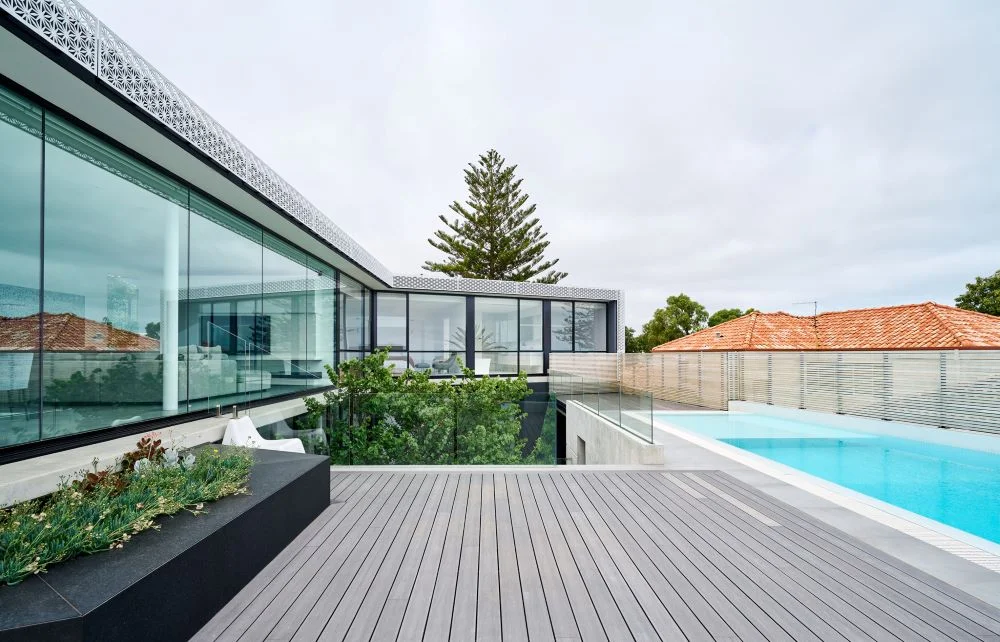 coastal home with perforated metal screens