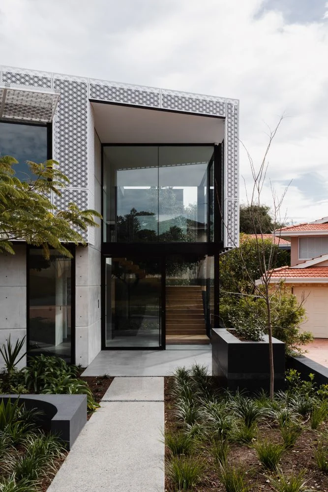 minimalist concrete home with ocean views