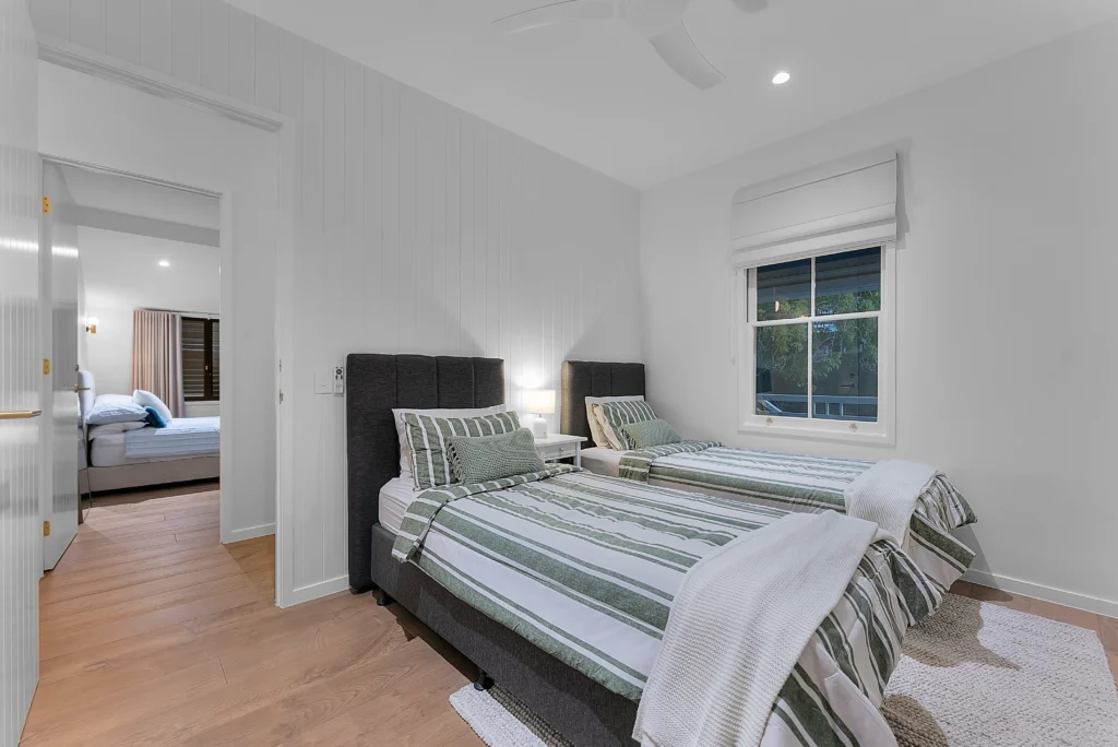 Traditional Queenslander and contemporary extension viewed from above