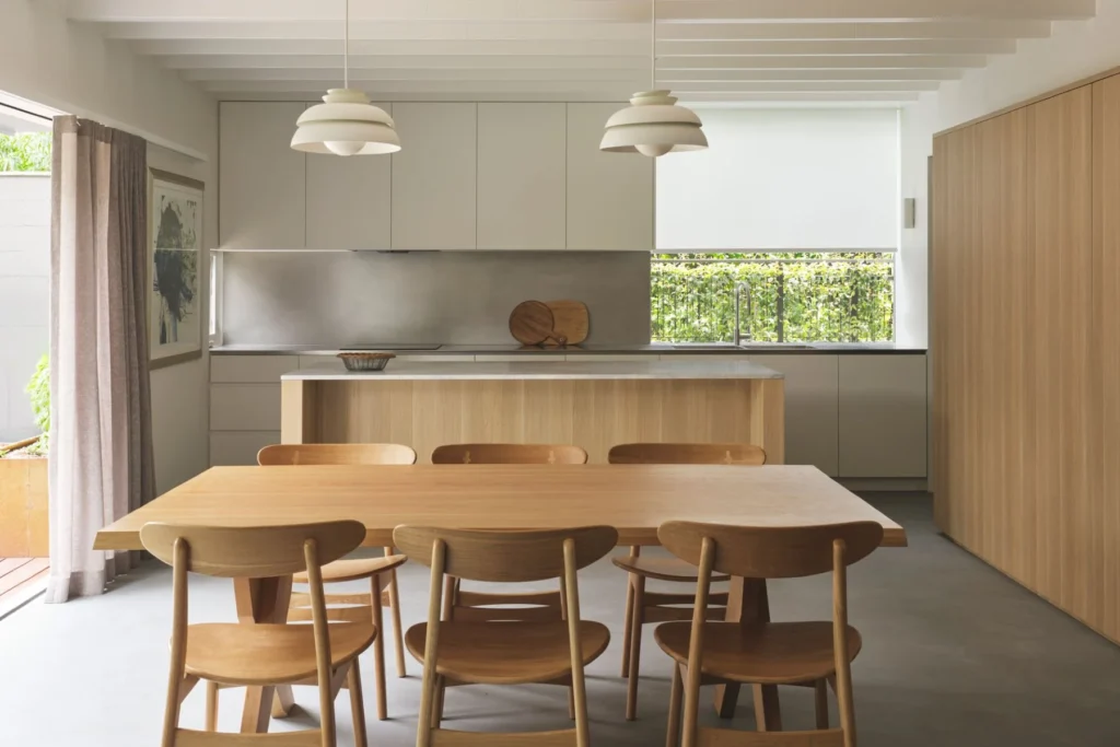 Open-plan kitchen and living space with polished concrete flooring in Balmain