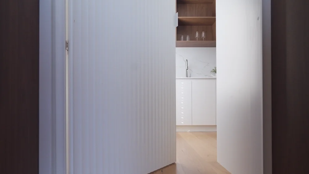 Custom walnut cabinetry by Brightwood Design Perth