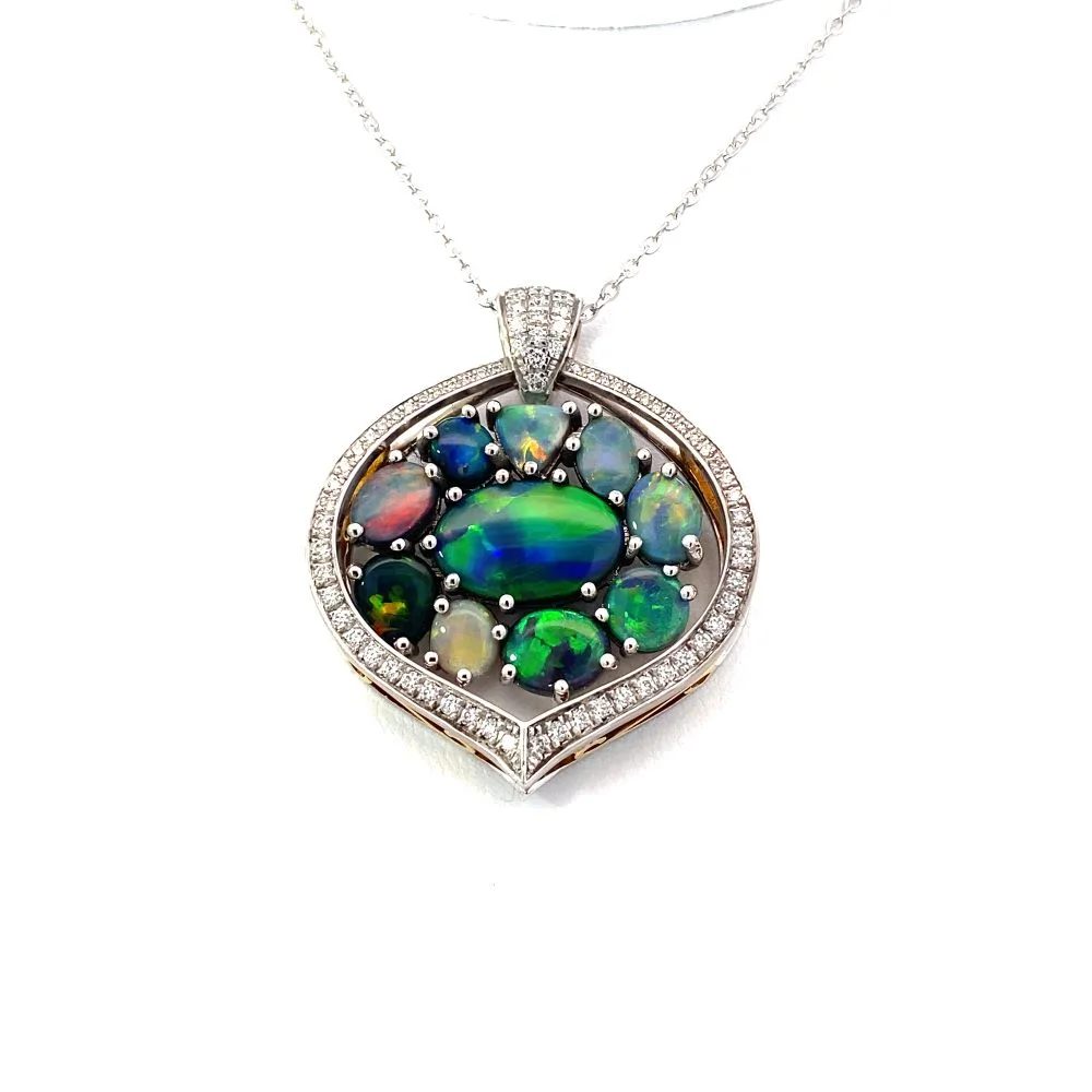 Australian opal pendant displaying vibrant blue and green colour