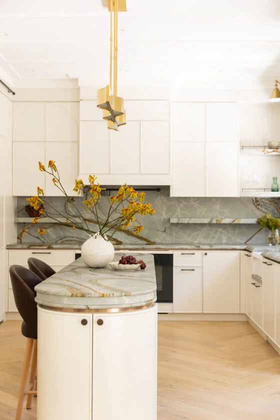 Cream kitchen cabinetry and quartzite island Neutral Bay